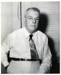 old man in a button up shirt