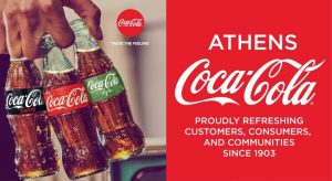 hand holding three types of coca cola