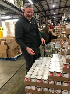 Gifting holiday meals, volunteers, Piggly Wiggly, Coca-Cola & Community Food Bank