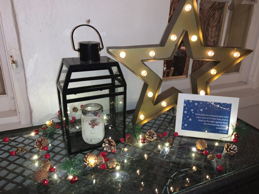 Star and lantern decor with Christmas lights